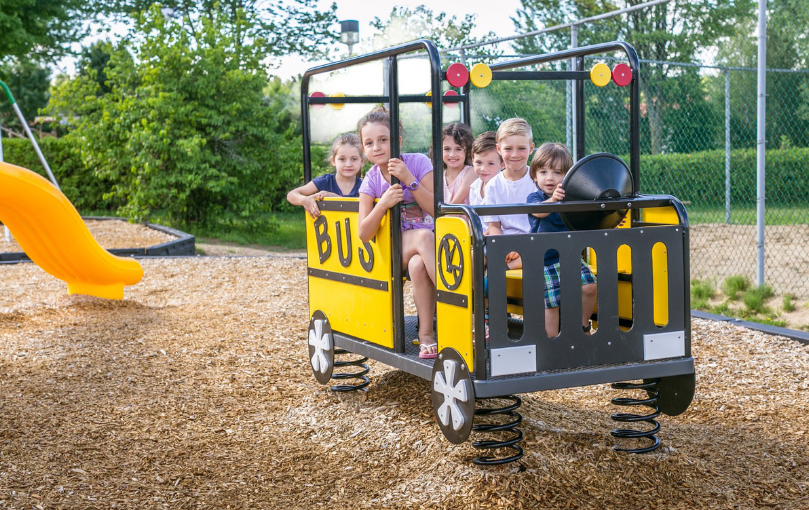 Playgrounds & Park Equipment Grants & Funding  - Image of Children Playing in a Park or School Playground - Northland Recreation Supply